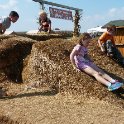 Sliding down hay bales